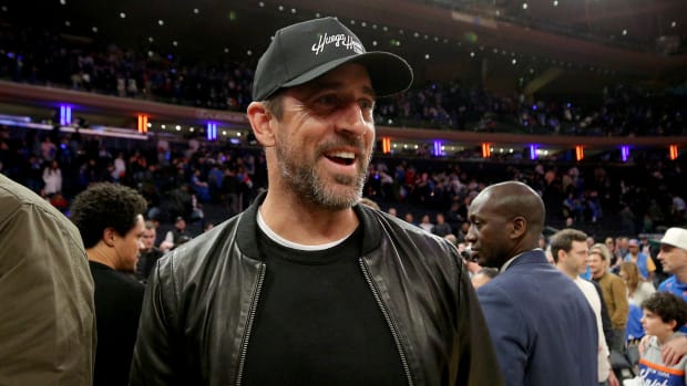 Jets quarterback Aaron Rodgers attends a Knicks' NBA Playoff game at MSG